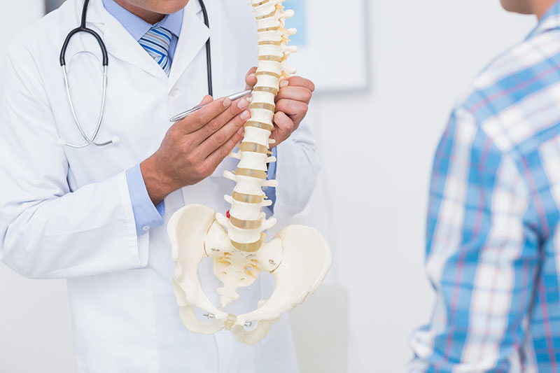 doctor describing spinal cord injury